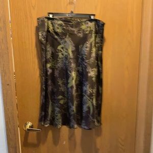 Calvin Klein brown silk skirt with pink and olive floral detail.